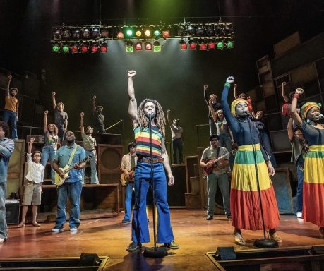 Performing with the cast of "Get Up Stand Up" at the Lyric Theatre Shaftesbury Avenue, London